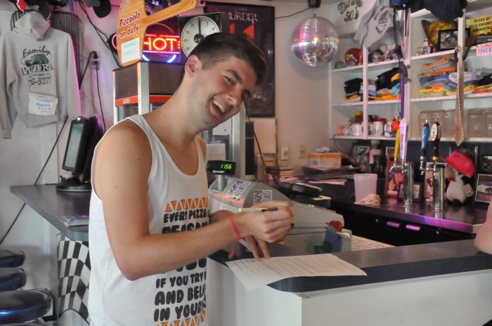 Patrick signing the waiver