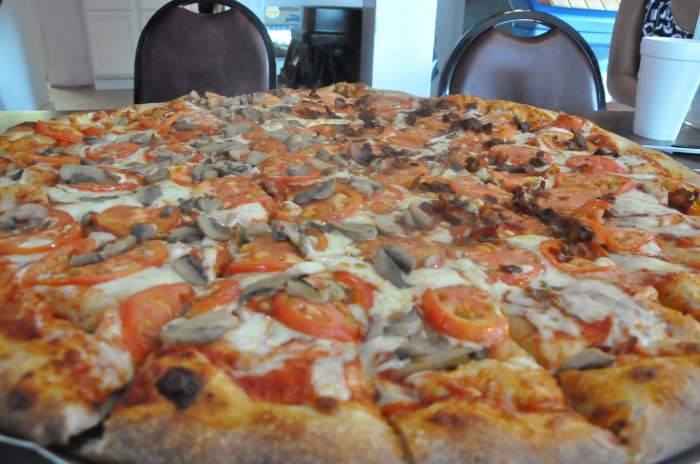 It's impossible to even understand how big this pizza is