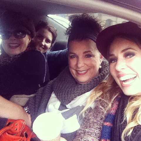 Here we are. Crammed into the back of a cab. because the taxi driver brought his child along.